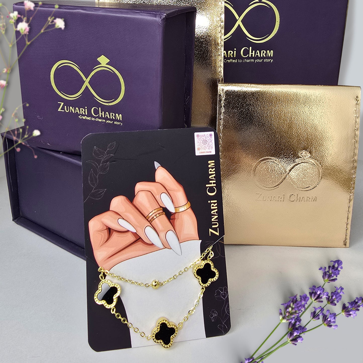 Zunari Charm black clover layered bracelet with premium packaging box and gold pouch gift ready jewelry