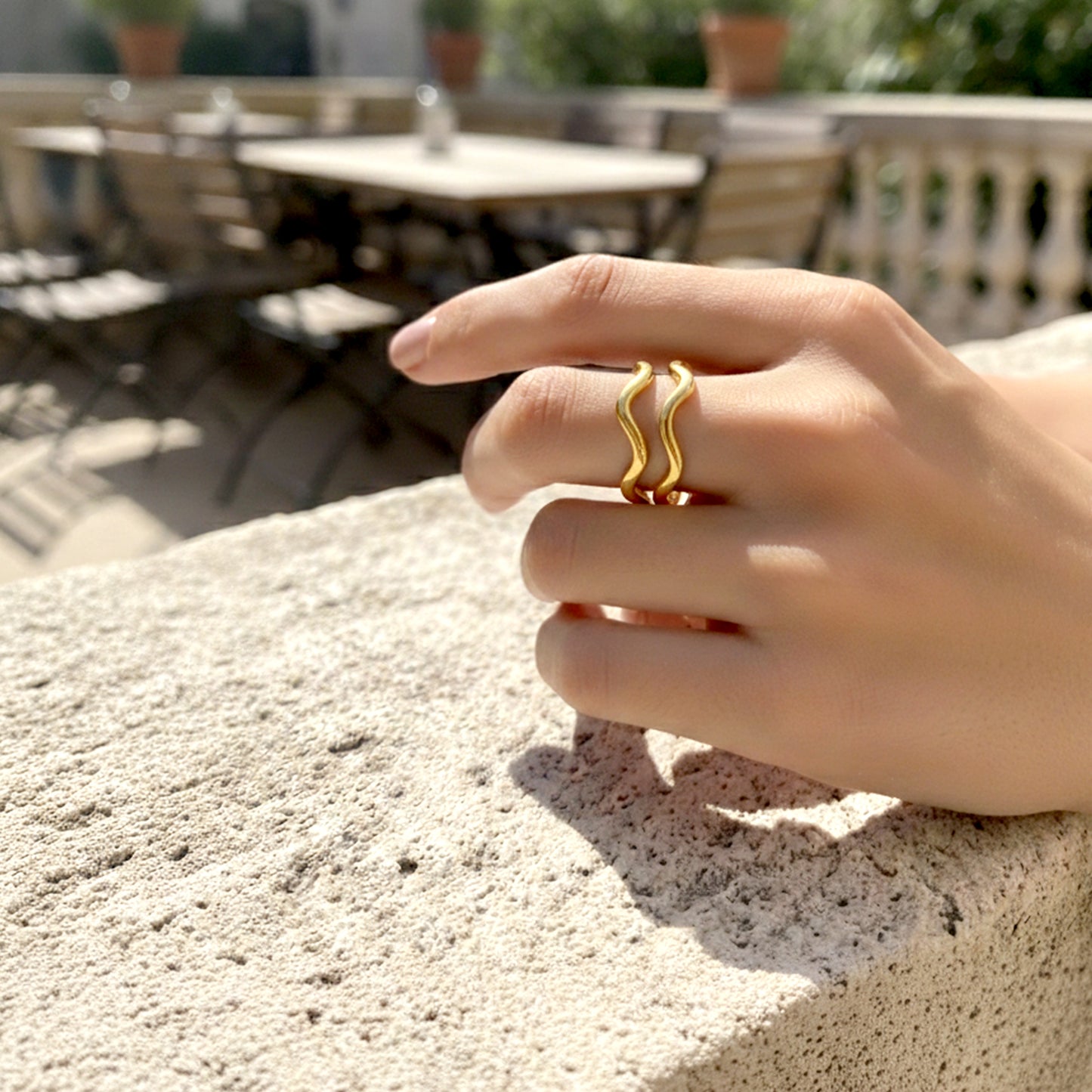 modern gold statement ring fluid wave design