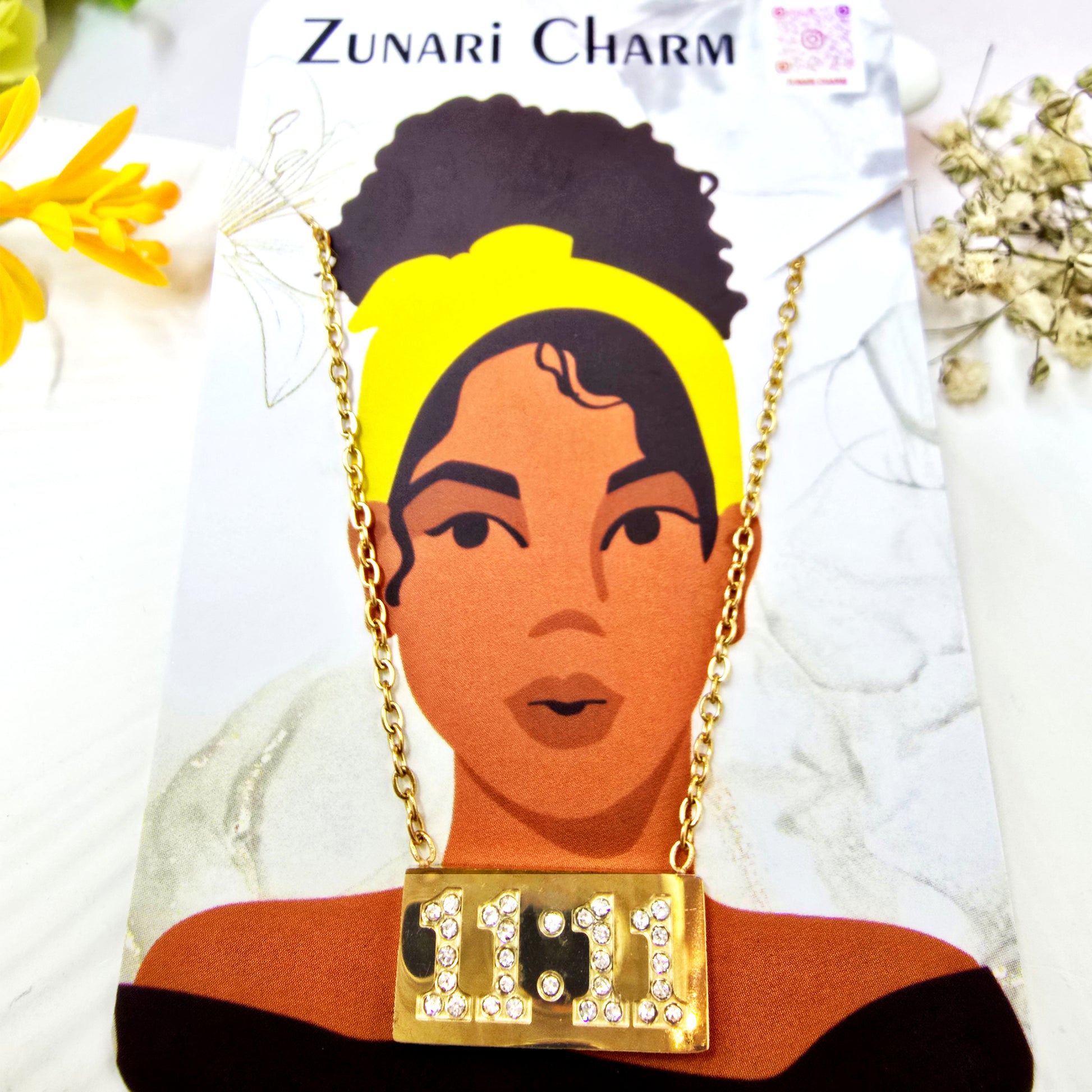 Necklace on Zunari Charm packaging card highlighting elegant gold design.
