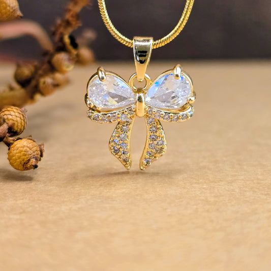 AD Bow Necklace – Elegant Gold Chain with Crystal Bow Pendant