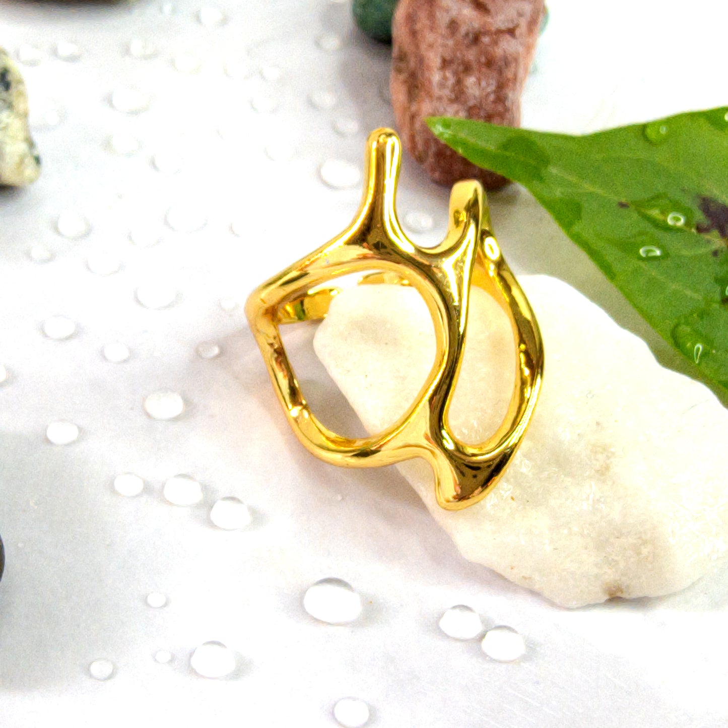 Gold Abstract Frame Ring styled with natural stones and green leaf