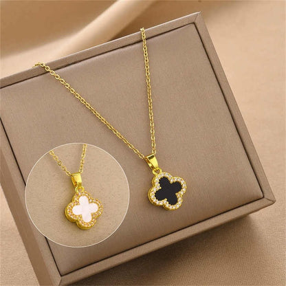 Gold Clover Pendant Chain in White Shell Enamel on jewelry box