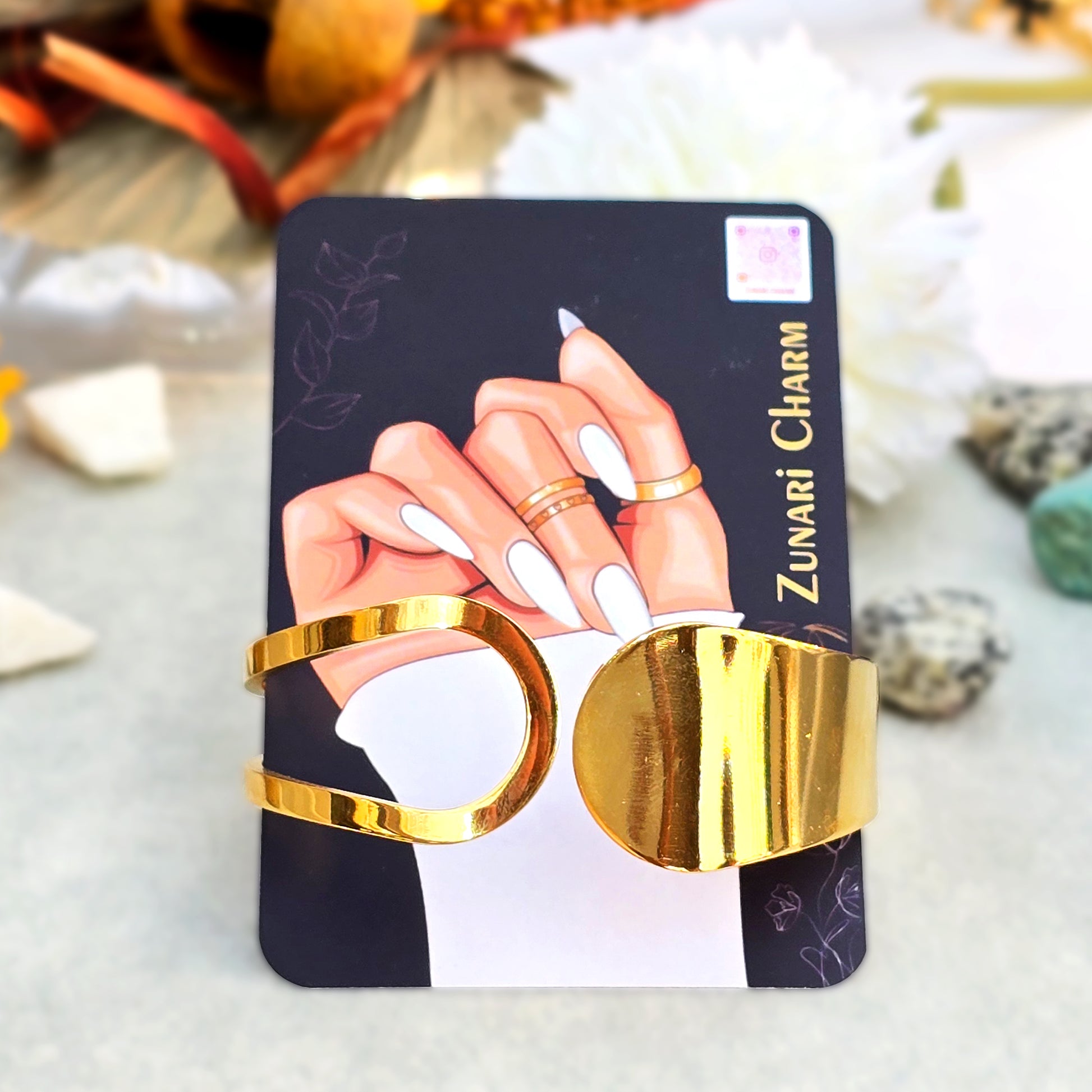 Bold Arc Bangle displayed on Zunari Charm branded packaging card.