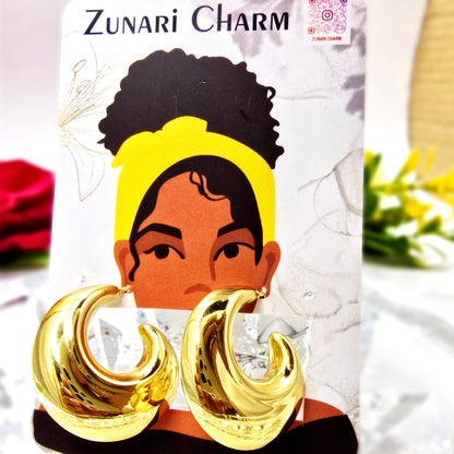 Bold Loop Earrings displayed on Zunari Charm branded card