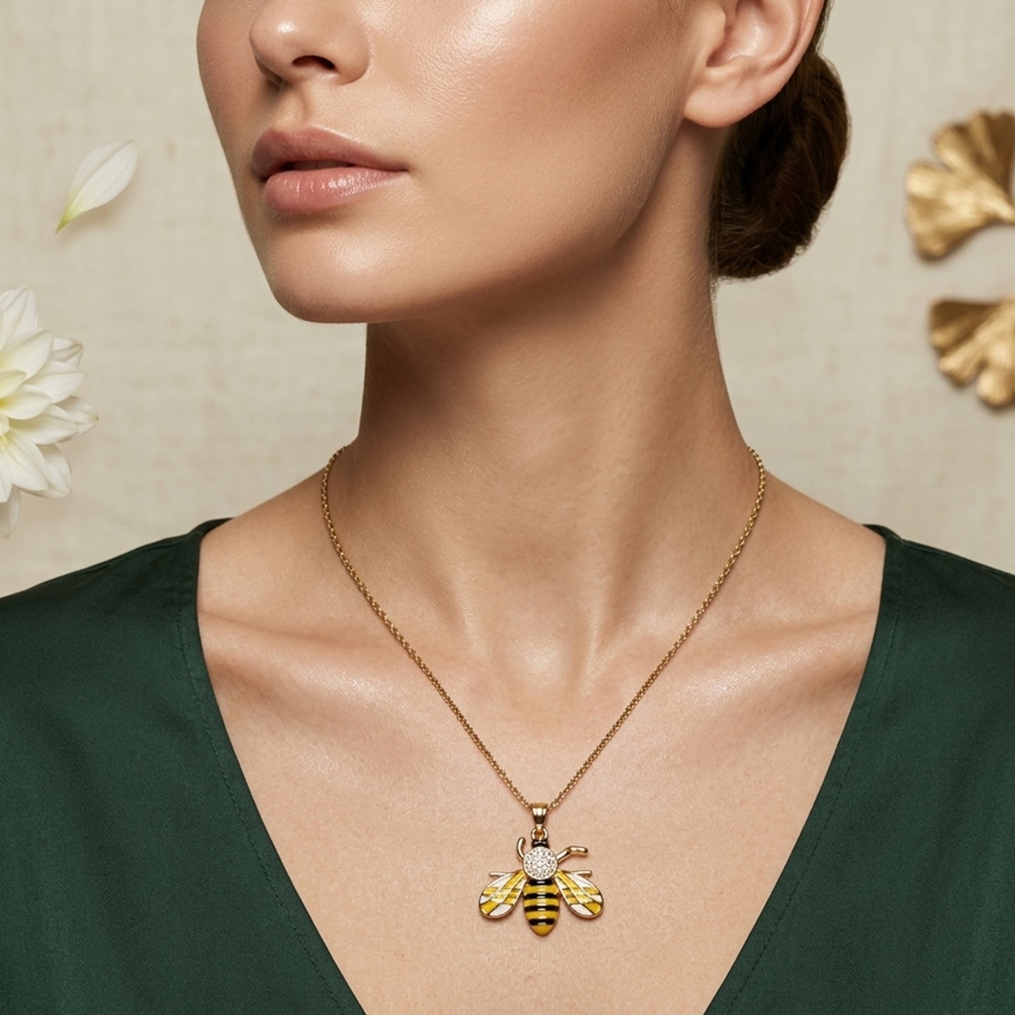 Golden honeybee pendant necklace on model minimal jewelry