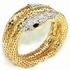 Coiled snake cuff bracelet with crystal face and scales – detailed macro shot