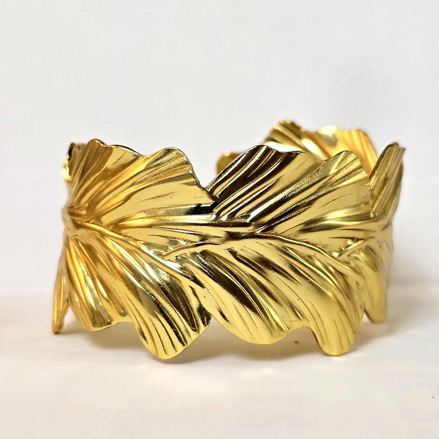 Eden gold leaf cuff bracelet front view statement jewelry