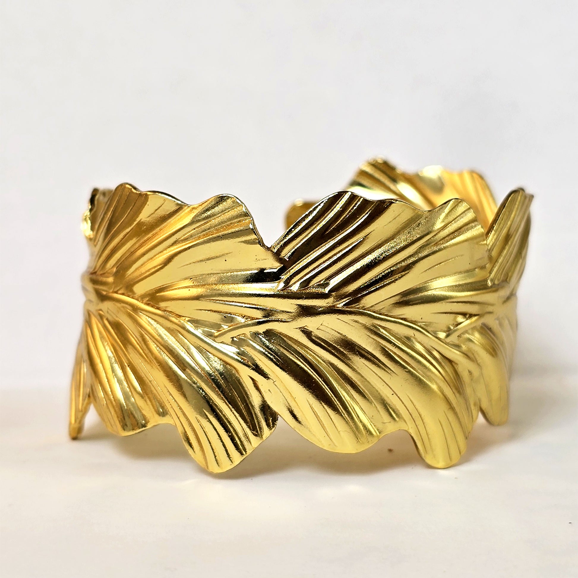 Eden gold leaf cuff bracelet front view statement jewelry