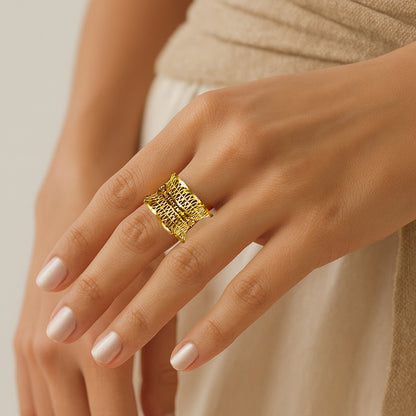 Model hand wearing the Empress Mesh Ring, showing bold mesh details in a royal design.