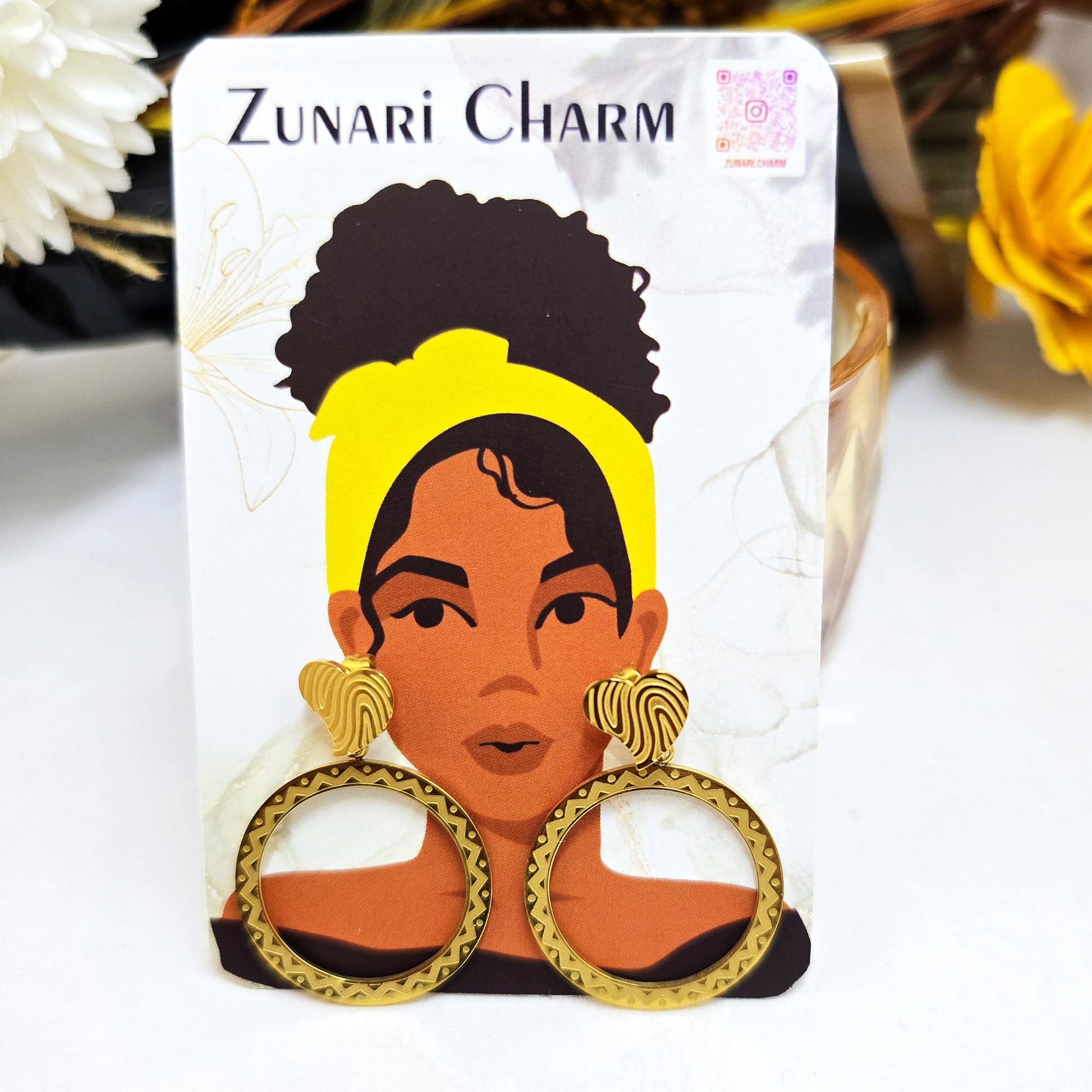 Etched heart multi-style earrings displayed on a Zunari Charm branded card with a yellow-turban illustration.