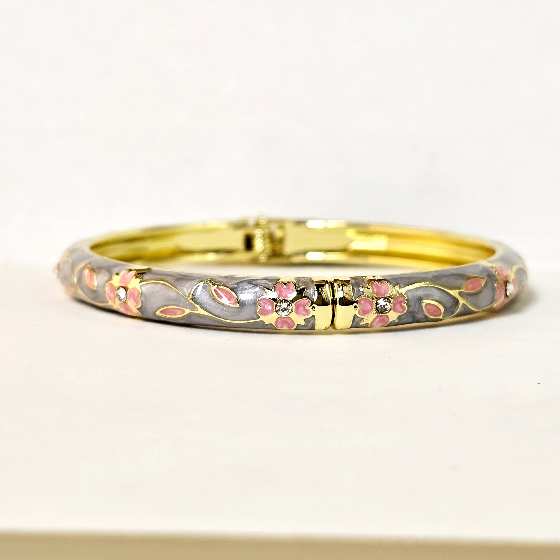 Grey floral gold bracelet front product image white background