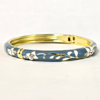 Teal enamel floral bangle bracelet front view white background