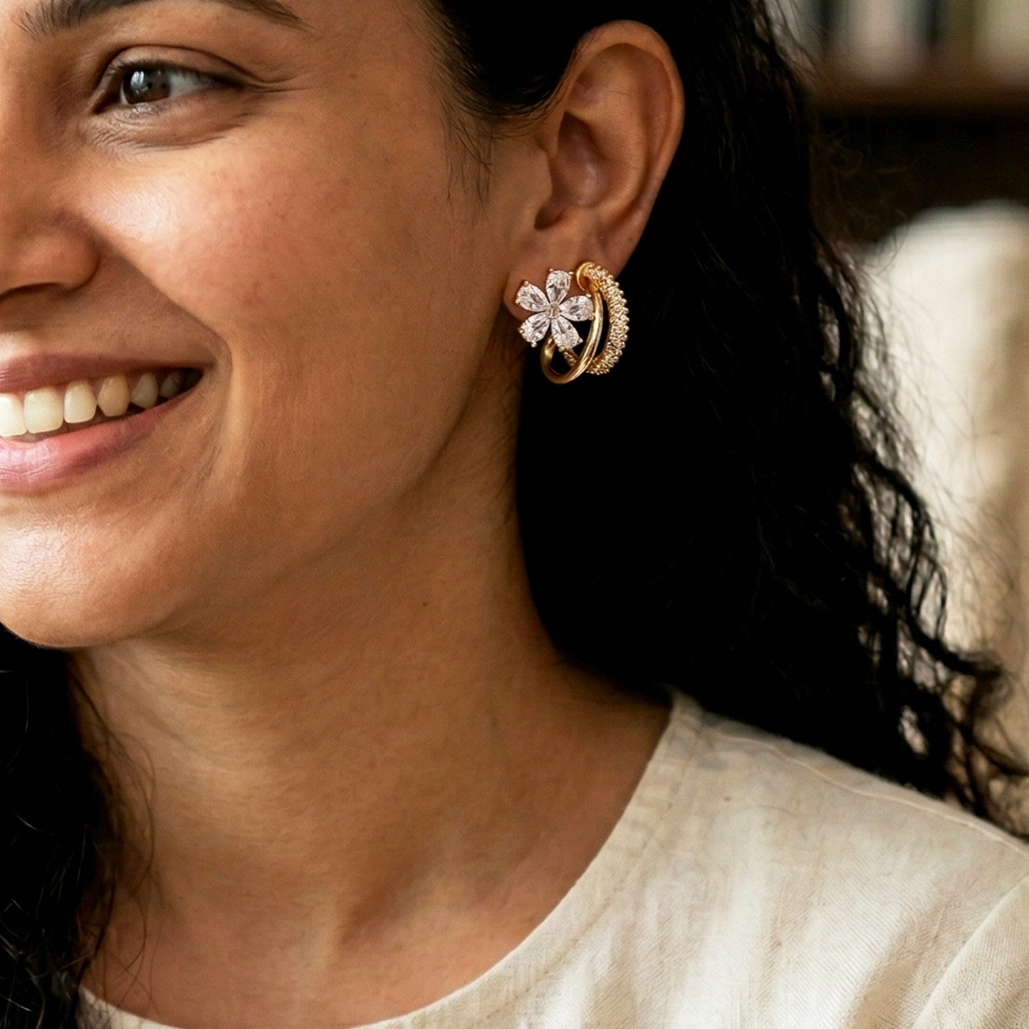 Floral zircon earrings worn by model close-up