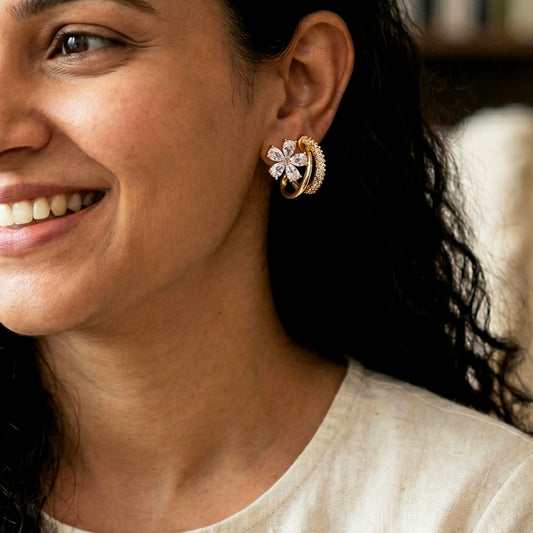 Floral zircon earrings worn by model close-up