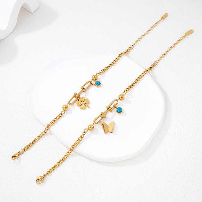 Zunari Charm gold charm bracelet with adjustable clasp and zircon accents