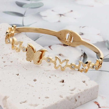 Elegant butterfly bracelet in gold with crystal accents