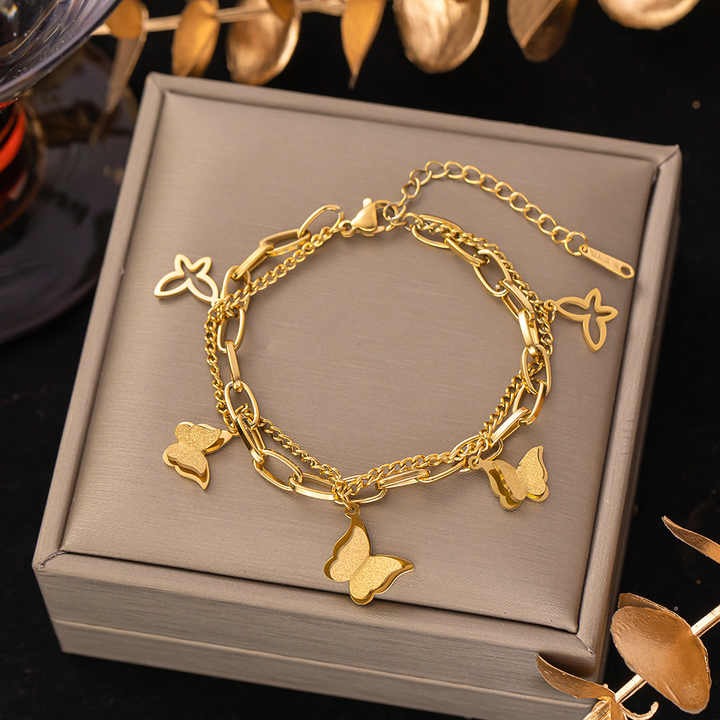 Bracelet placed flat with golden leaves