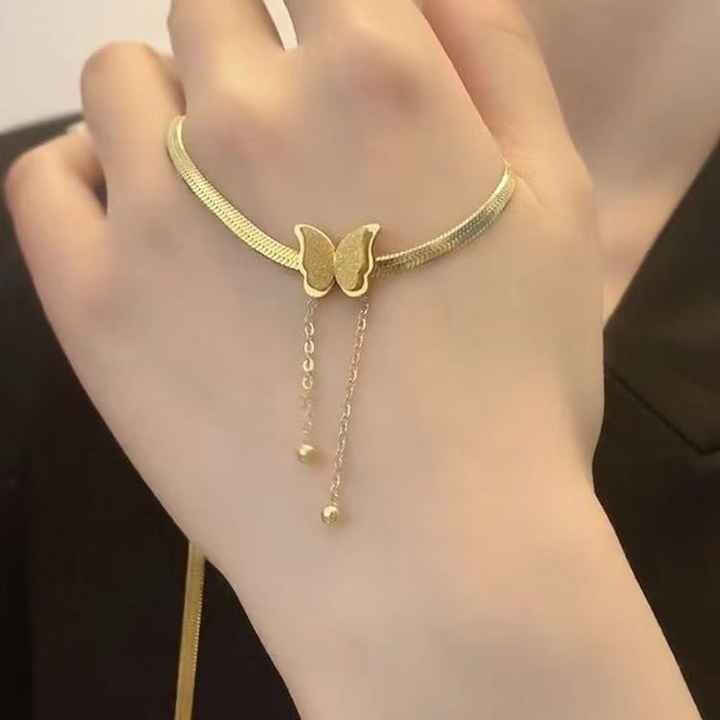 Zunari Charm gold necklace on wrist styled as bracelet