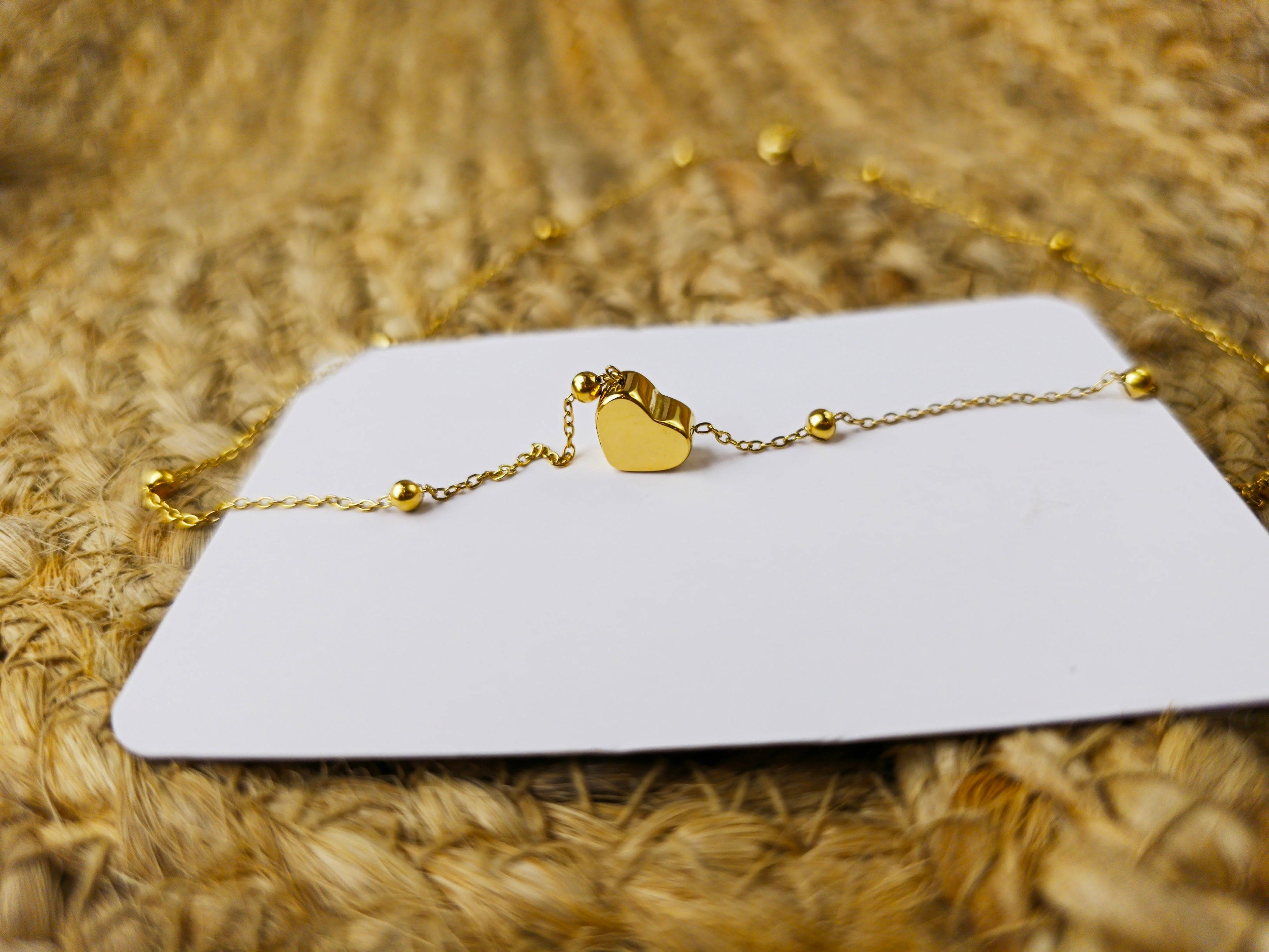 Minimalist Heart Pendant Bead Necklace displayed on white card – Zunari Charm