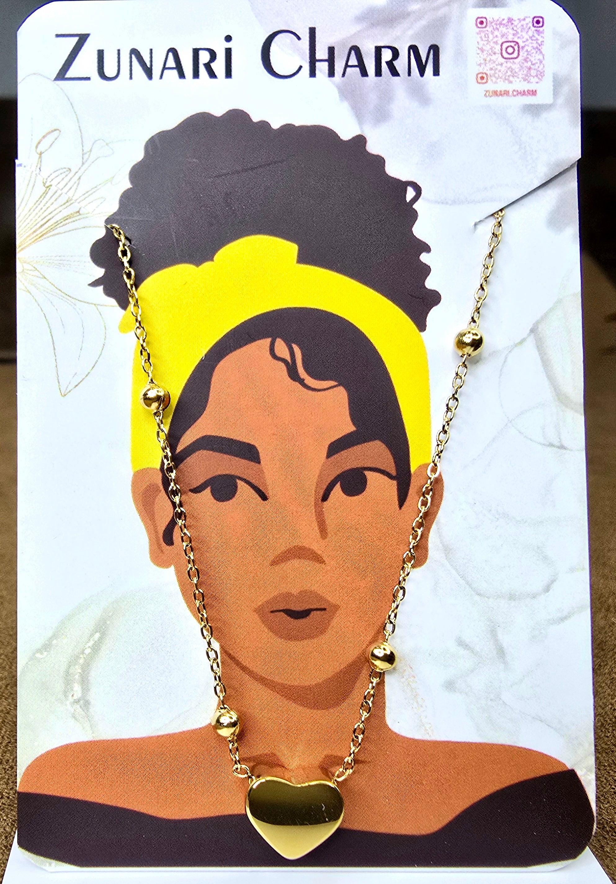 Heart Bead Necklace displayed on Zunari Charm packaging card – Zunari Charm