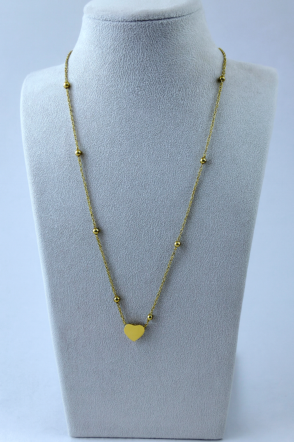 Gold Heart Bead Necklace on grey velvet display stand – Zunari Charm