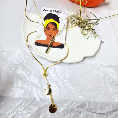 Necklace displayed with Zunari Charm card – gold layered pendant jewelry