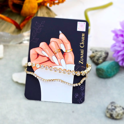 Lumière layered crystal bracelet displayed on Zunari Charm branded packaging card.