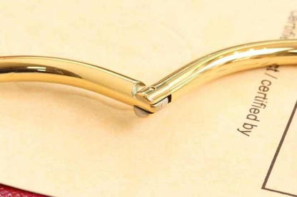 Close-up of the hidden clasp of the gold nail bangle