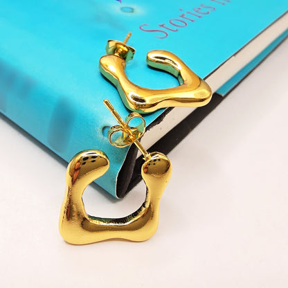 Close-up of Modern Melt Earrings with molten-inspired design