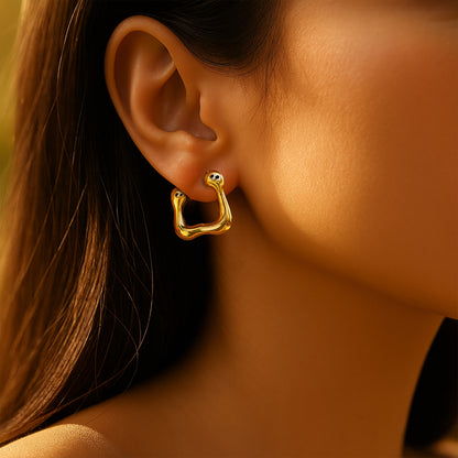 Lifestyle image – Modern Melt Earrings worn on model’s ear
