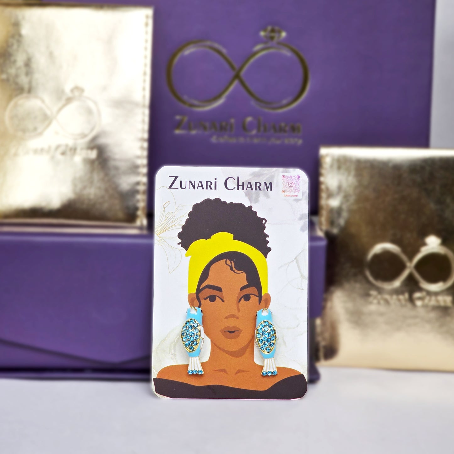 Zunari Charm packaging with bird earrings display card