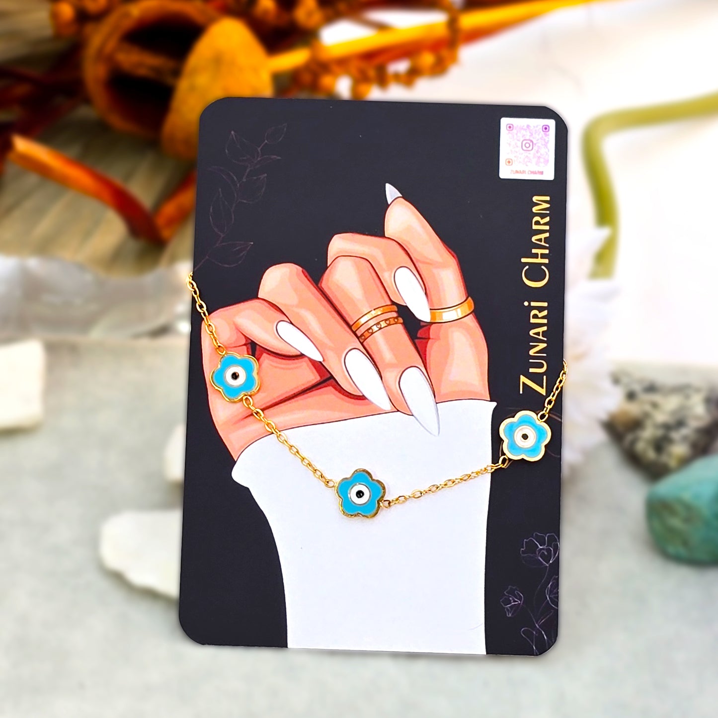 The Mystic Teal Bracelet displayed on the official Zunari Charm packaging card.