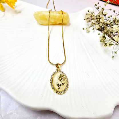 Opal Flower Pendant Chain displayed on white shell background with gold floral pendant and crystal border.