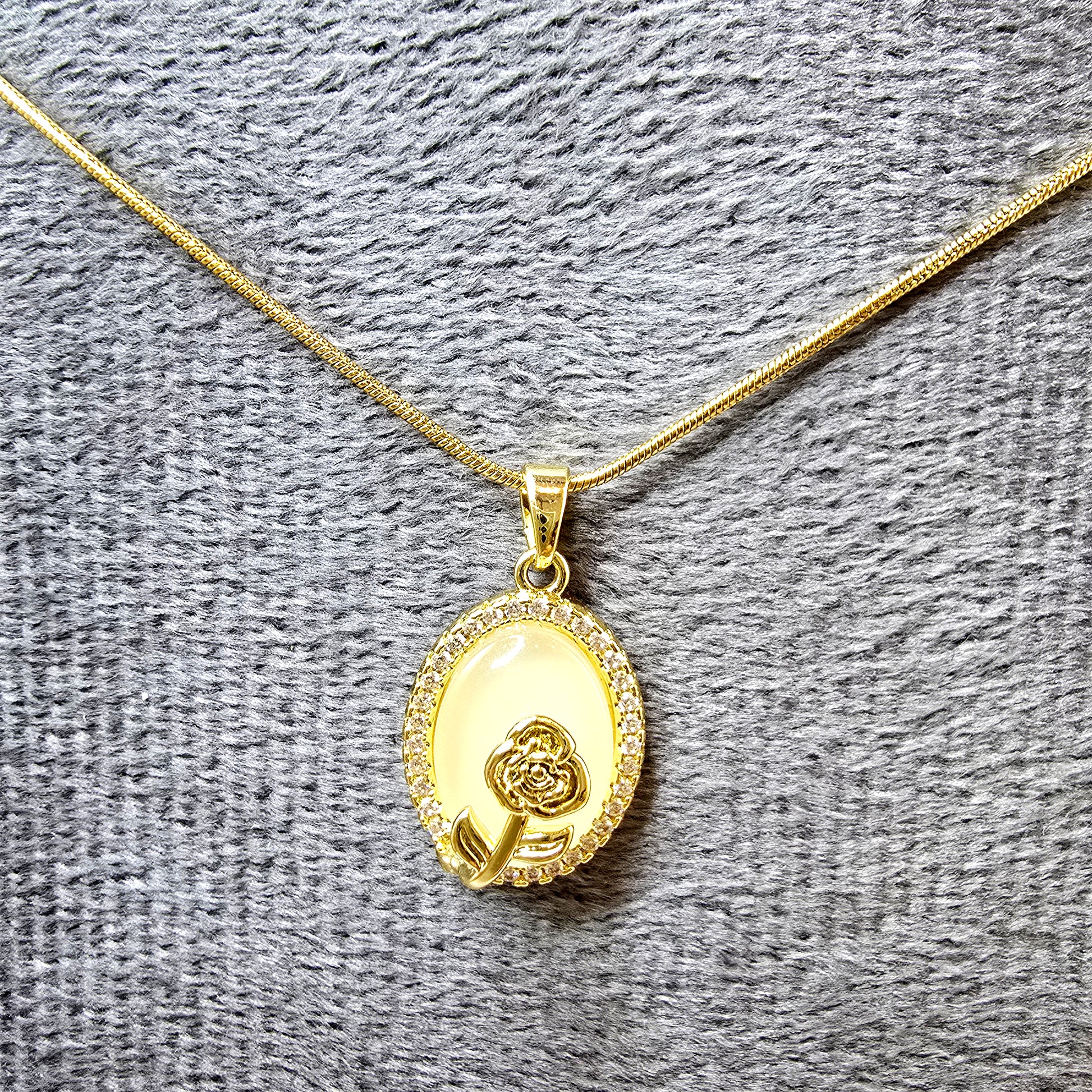 Close-up of Opal Flower Necklace on grey velvet showing intricate detailing and shine.