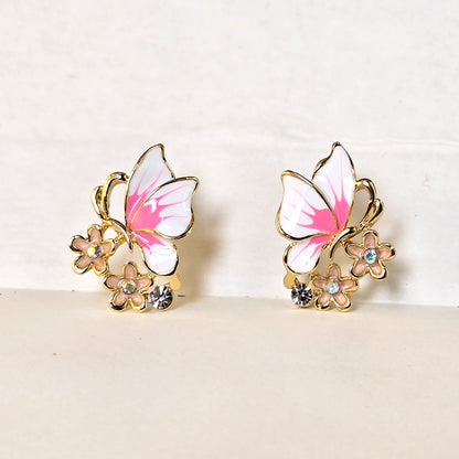 Pink butterfly enamel earrings with floral design front view
