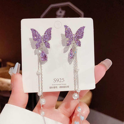 Purple butterfly earrings with pearl chain drops and lavender crystal accents - Zunari Charm