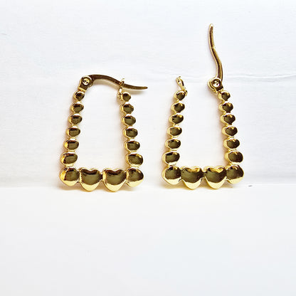 Rectangle Heart Hoop Earrings – gold geometric hoops with bold heart accents on white background