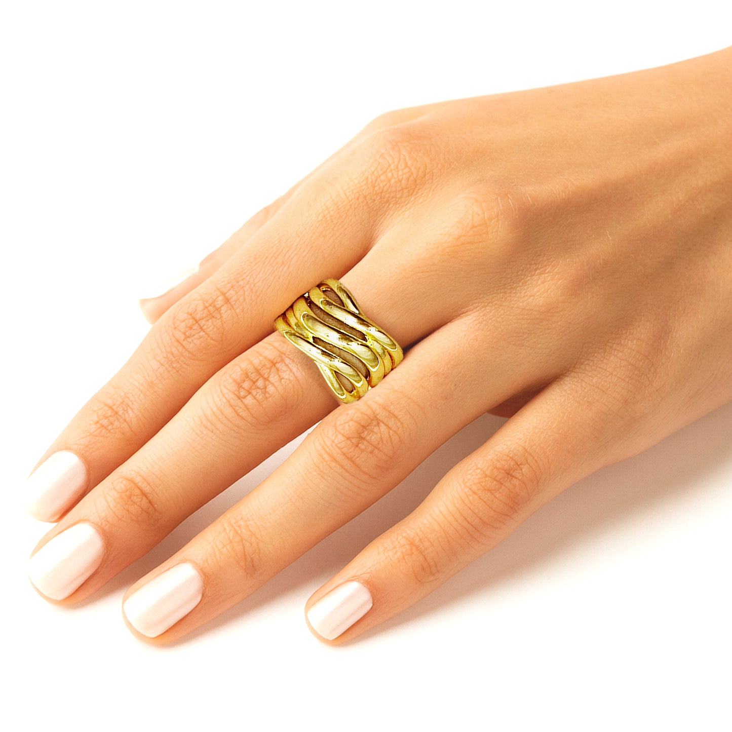 A model’s hand wearing the Ripple Band Ring, styled as a bold statement piece.