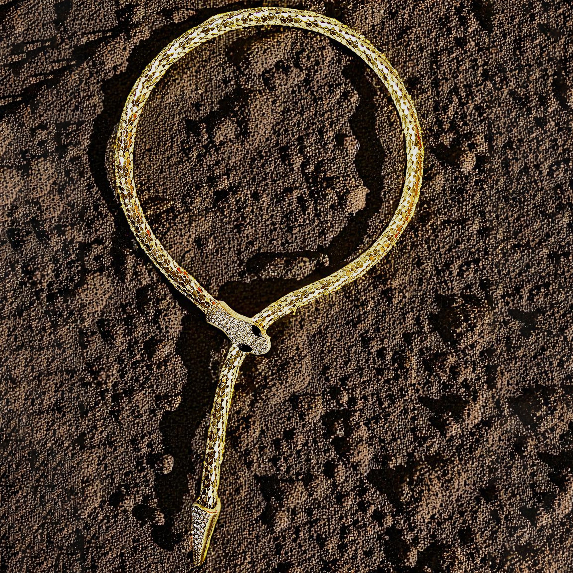 Serpent Embrace Necklace placed on textured soil background – luxury vibe
