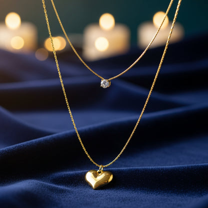 Shine in Love Necklace on navy fabric with glowing candlelight aesthetic.