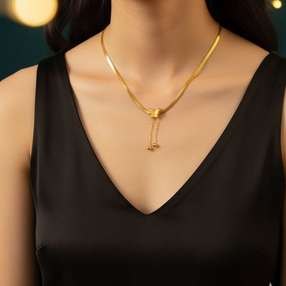 Model wearing Snake Chain Butterfly Necklace with V-neck black dress – minimal and refined.