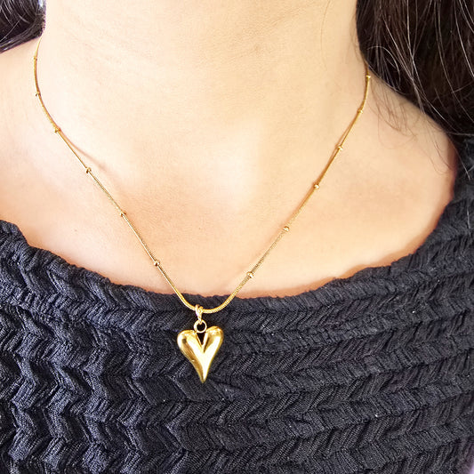 Model wearing TearDrop Heart Pendant Chain – gold beaded chain with teardrop heart pendant
