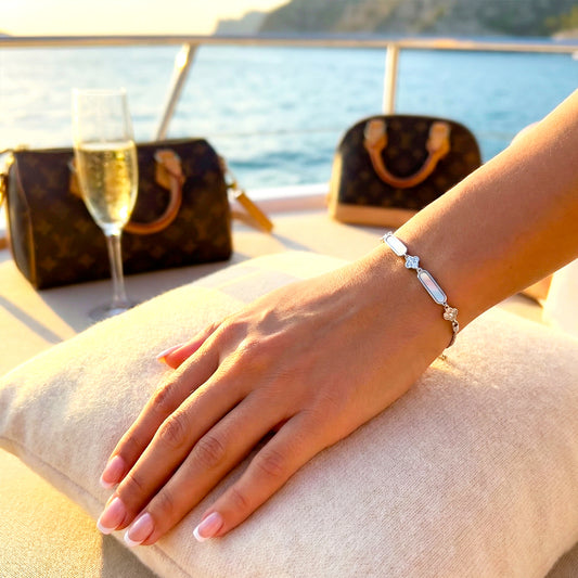 Woman wearing the Timeless Silver Brick Bracelet, highlighting the sparkle of the crystals against the skin.
