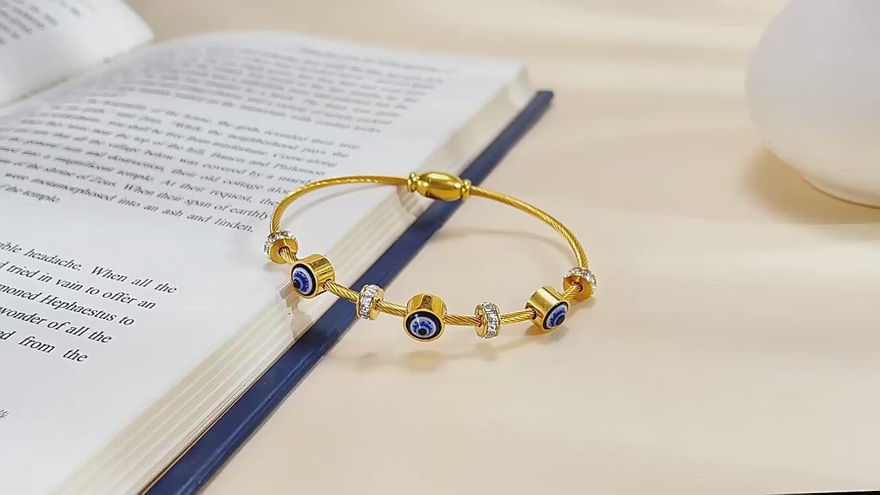 Video Showcasing Premium quality and luxurious Evil Eye Oil Drip Bangle.