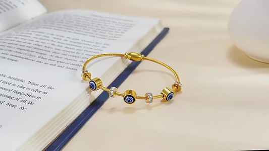 Video Showcasing Premium quality and luxurious Evil Eye Oil Drip Bangle.
