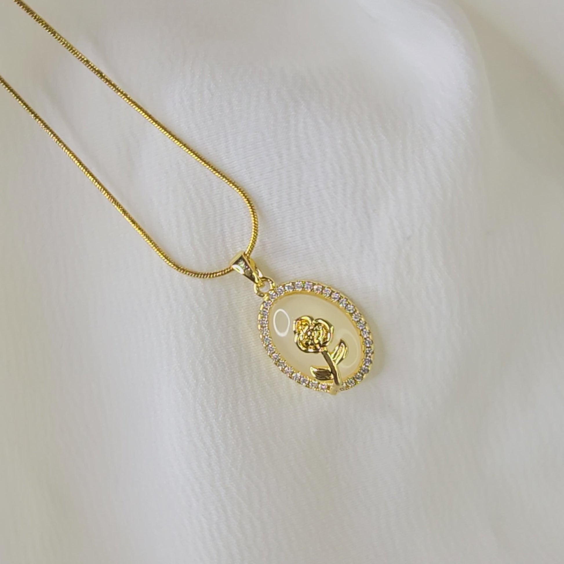 360° video of Opal Flower Pendant Chain showing shimmer, opal base & fine detailing.