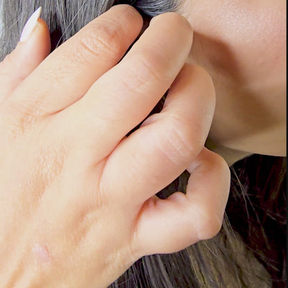 Video demonstration of the Blush Drop earrings, showcasing the shimmer of the crystals and the fluidity of the hanging chains.