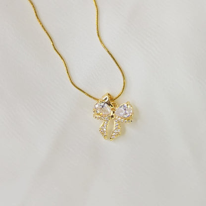 360-degree video of AD Bow Necklace showing pendant details and sparkle under light.
