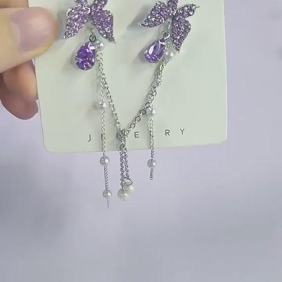 Purple butterfly earrings with pearl chain drops and lavender crystal accents - Zunari Charm