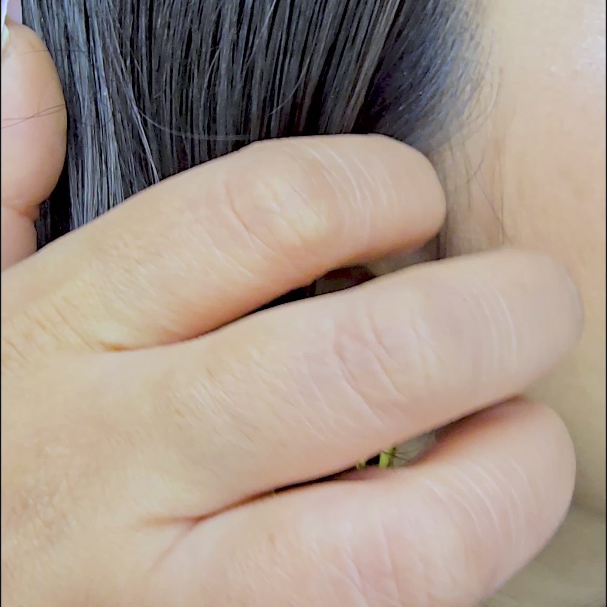 Video demonstration showing the brilliant 18k gold shine and secure fit of the molten teardrop studs on a model.